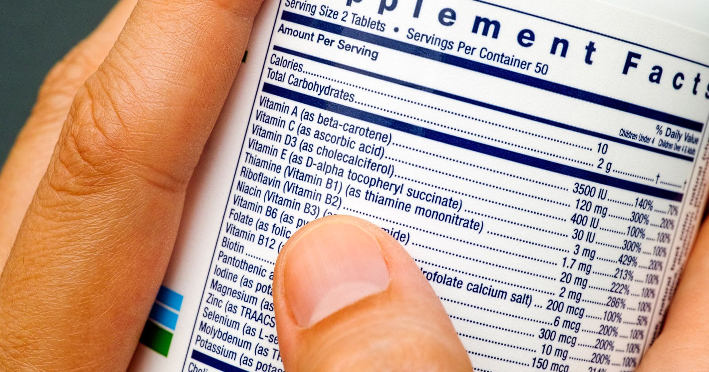 Vitamin Supplement label being looked at