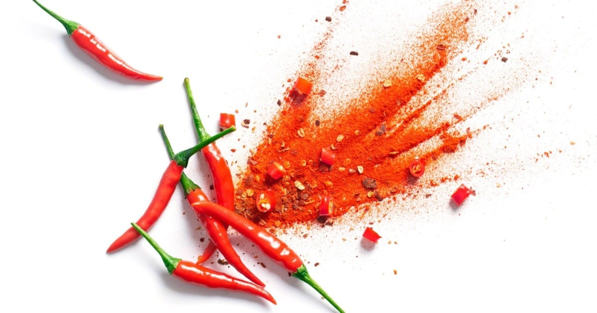 Cayenne peppers spread out on a table